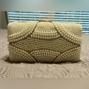 Pearl-filled white clutch!